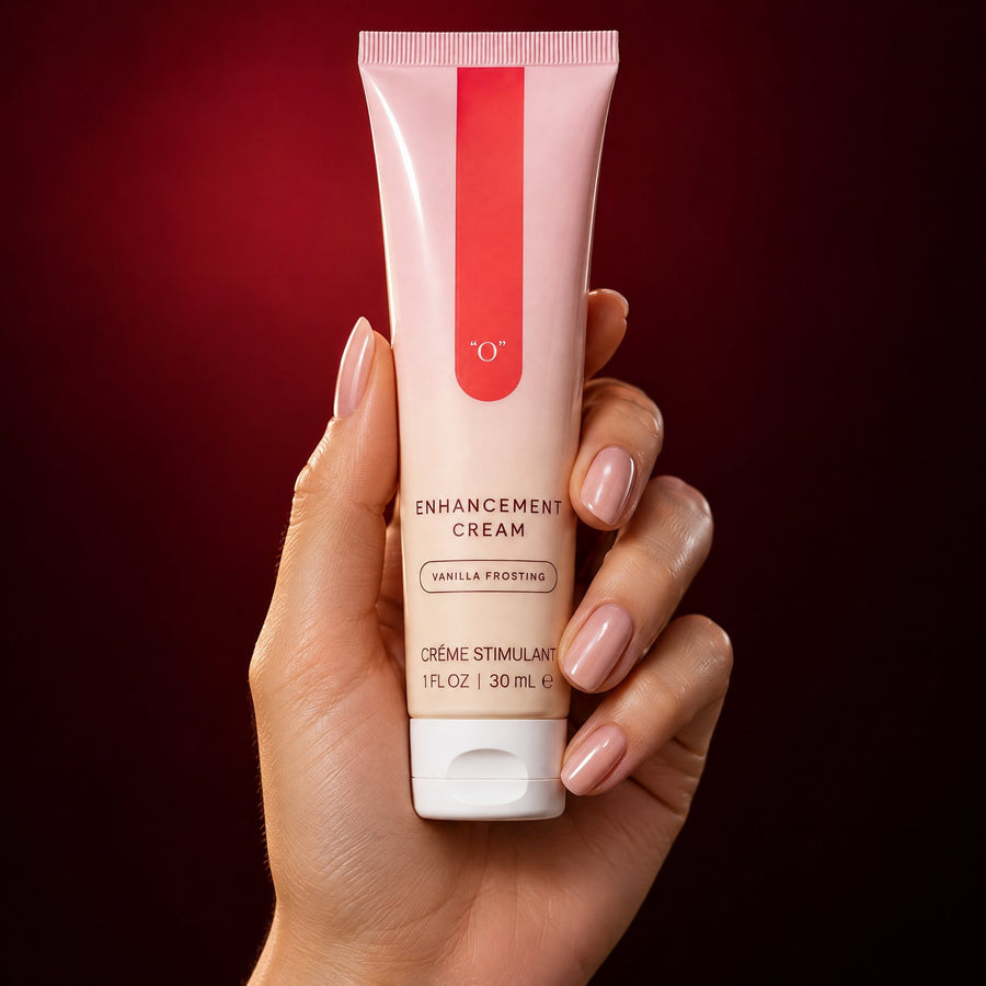 A hand holding the OhMinx tube